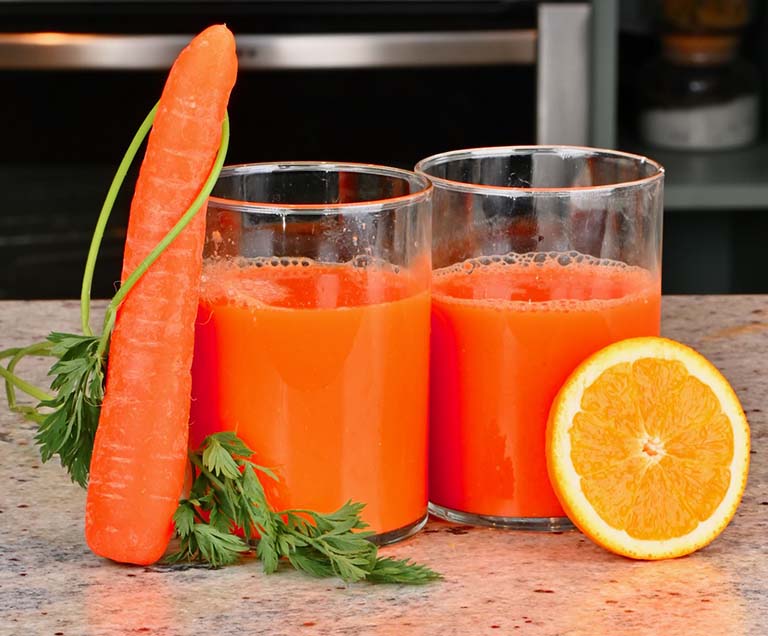Uống nước cam có hại dạ dày không