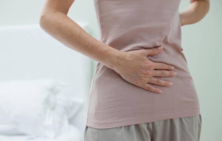 Đau dạ dày lan ra sau lưng là dấu hiệu của bệnh gì?
